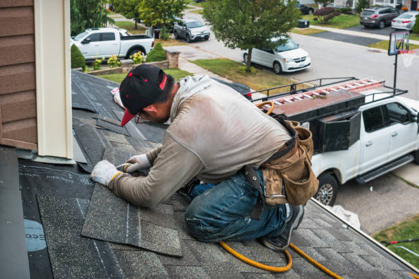 Professional Emergency Roof Repair technician working in Bringhurst, IN